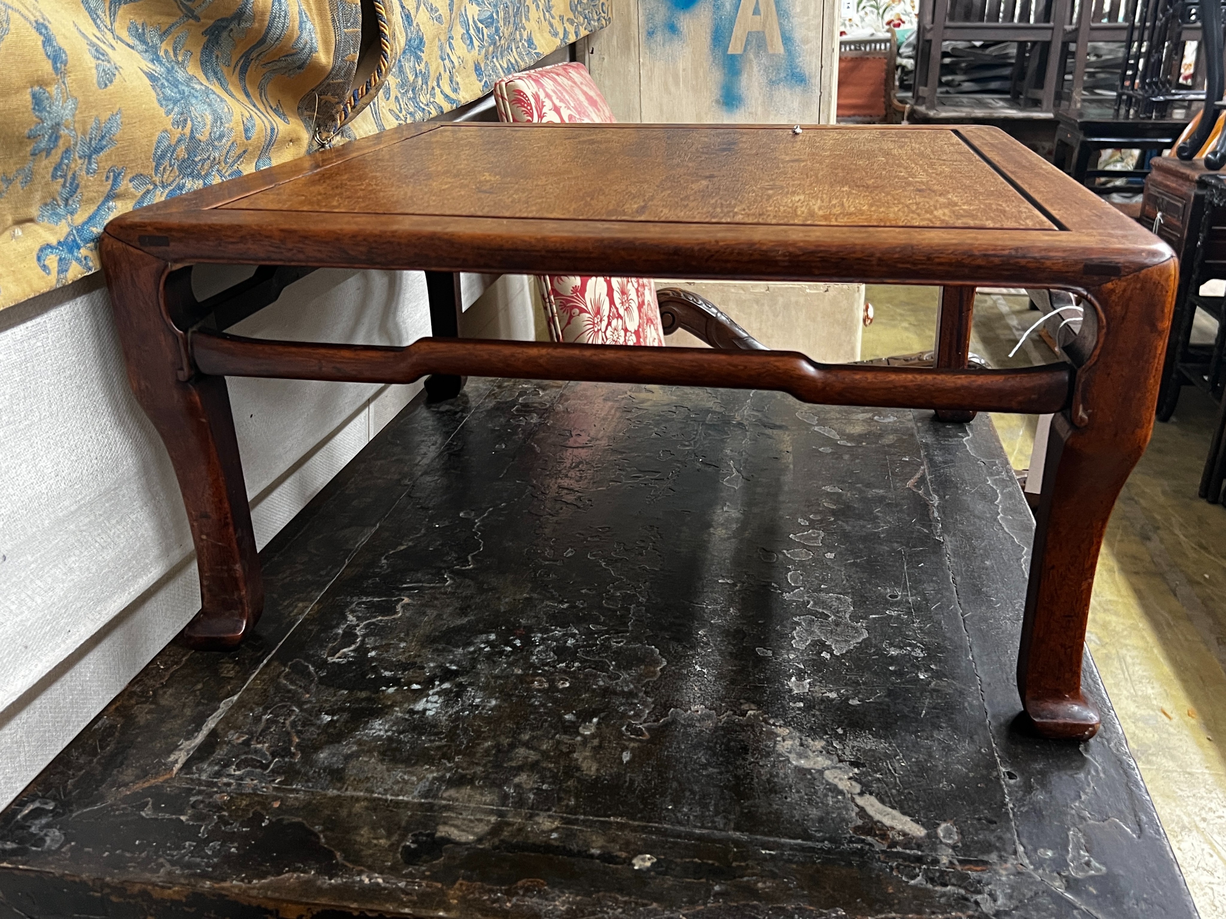 A Chinese carved hardwood square low table, width 59cm, height 29cm